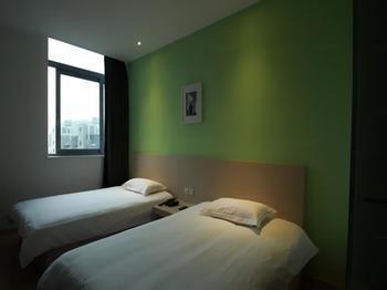 Motel 168 Shanghai Pudong Huinan Metro Station Tesco Екстер'єр фото